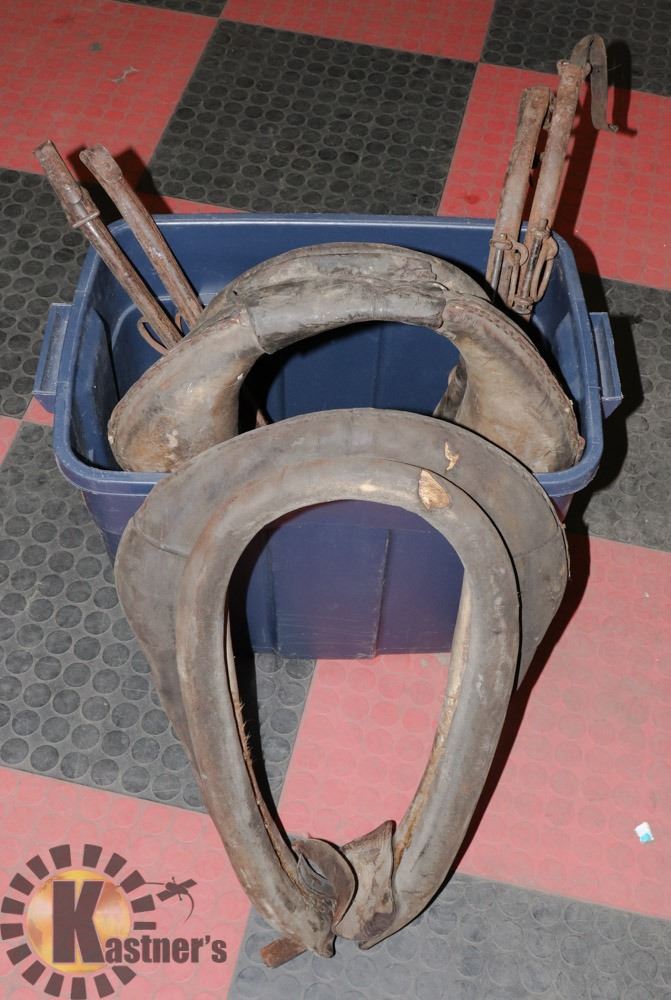 23 ANTIQUE HORSE COLLARS WITH 2 SETS OF METAL Kastner Auctions