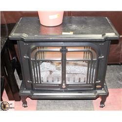 CAST IRON ELECTRIC FIRE PLACE.