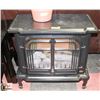 Image 1 : CAST IRON ELECTRIC FIRE PLACE.