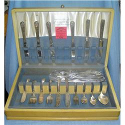 Box full of silver plate flatware