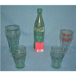 Group of Coca Cola collectibles