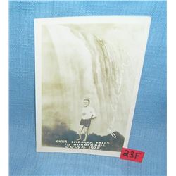 Man over Niagara Falls in a rubber ball post card
