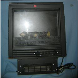 Electric illuminated fire place heater