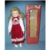 Image 1 : Red and white felt dressed collectible porcelain doll