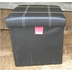 Upholstered hassock with storage compartment