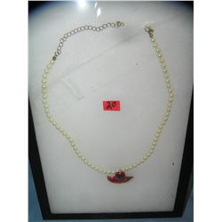 Costume jewelry pearl style necklace