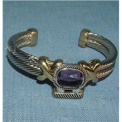 Quality silver tone bracelet with large purple stone