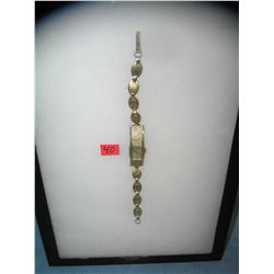 Early Swank gold toned wrist watch with 17 jewels