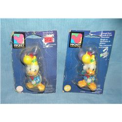 Pair of early Disney figural character candles