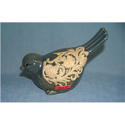 Porcelain painted bird 3 inches high by 6 inches long