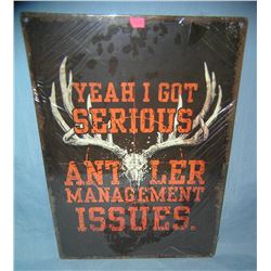 All tin Antler management issues advertising sign