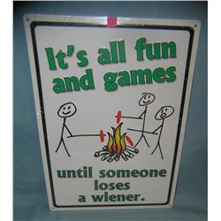 Tin fun and games until some one loses a weiner sign