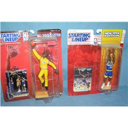 Pair of vintage basketball starting lineup sports