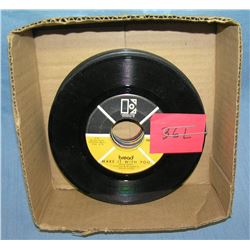 Box of vintage 45 RPM records