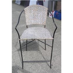 Wrought iron and wicker chair