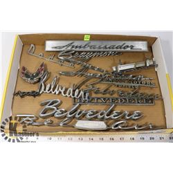 LOT OF VINTAGE VEHICLE FENDER EMBLEMS.