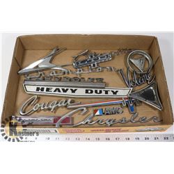 LOT OF VINTAGE VEHICLE FENDER EMBLEMS.