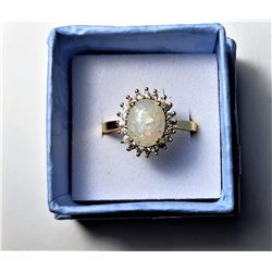 7)  LAB CREATED WHITE FIRE OPAL AND