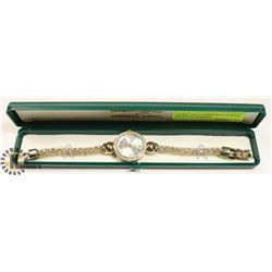 LADIES GOLD TONED WATCH WITH CRYSTALS IN BAND