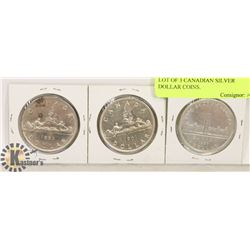 LOT OF 3 CANADIAN SILVER DOLLAR COINS.
