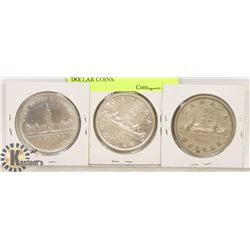LOT OF 3 CANADIAN SILVER DOLLAR COINS.