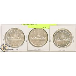 LOT OF 3 CANADIAN SILVER DOLLAR COINS.