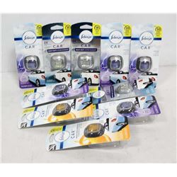 BAG OF FEBREZE CAR VENT CLIPS.