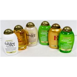 6 BOTTLES OF OGX SHAMPOO AND CONDITIONER.
