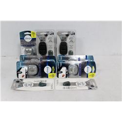 BAG OF FEBREZE AND GLADE CAR VENT CLIPS.