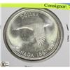 Image 1 : 1967 CANADIAN DIVING SILVER ONE DOLLAR COIN.