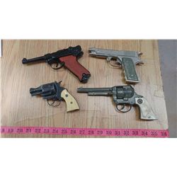 4 TOY CAP GUNS