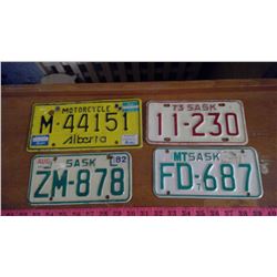 FOUR MOTORCYCLE PLATES - SASKATCHEWAN AND ALBERTA