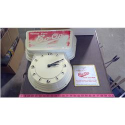 CO-OP WALL CLOCK AND CO-OP ADVERTISING PIECE