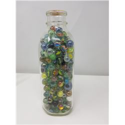 MILK BOTTLE FULL OF MARBLES