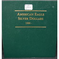ALBUM OF AMERICAN EAGLE SILVER DOLLARS
