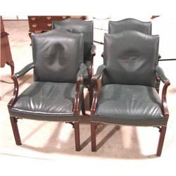 SET OF FOUR LEATHER ARM CHAIRS