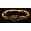 Image 1 : 14K GOLD BRACELET SET WITH EMERALDS AND