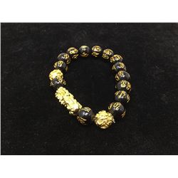 Beaded Bracelet with Golden Dragon
