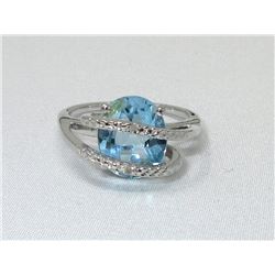Large Blue Topaz & Diamond Crossover Ring