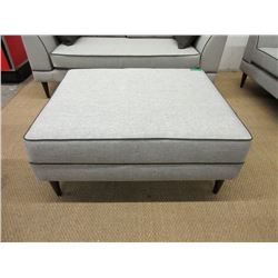 New Grey Fabric Ottoman w/ Contrasting Piping
