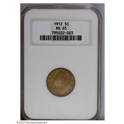 1912 5C MS65 NGC. Richly colored with rose, gold, and 1912[5C] MS65 NGC.