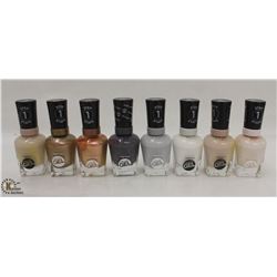 8 BOTTLES OF ASSORTED COLOR SALLY HANSEN COMPLETE