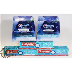 LOT OF CREST WHITESTRIPS AND COLGATE TOOTHPASTE.