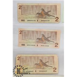 LOT OF 3 CANADIAN 1986 TWO DOLLAR BILLS.