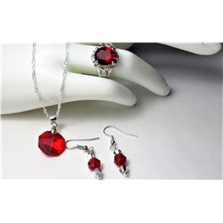 11)  SUITE OF SILVER TONE AND RED CZ