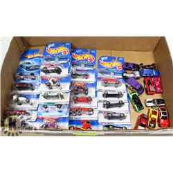 BOX OF HOT WHEELS NEW AND USED.