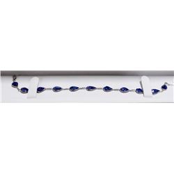 33) 14K WHITE GOLD TANZANITE BRACELET,