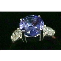34) 10K WHITE GOLD TANZANITE AND DIAMOND RING,