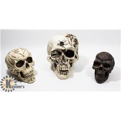 LOT OF 3 DECORATIVE SKULLS
