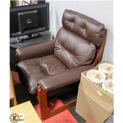 BROWN LEATHER WOOD FRAMED CHAIR.
